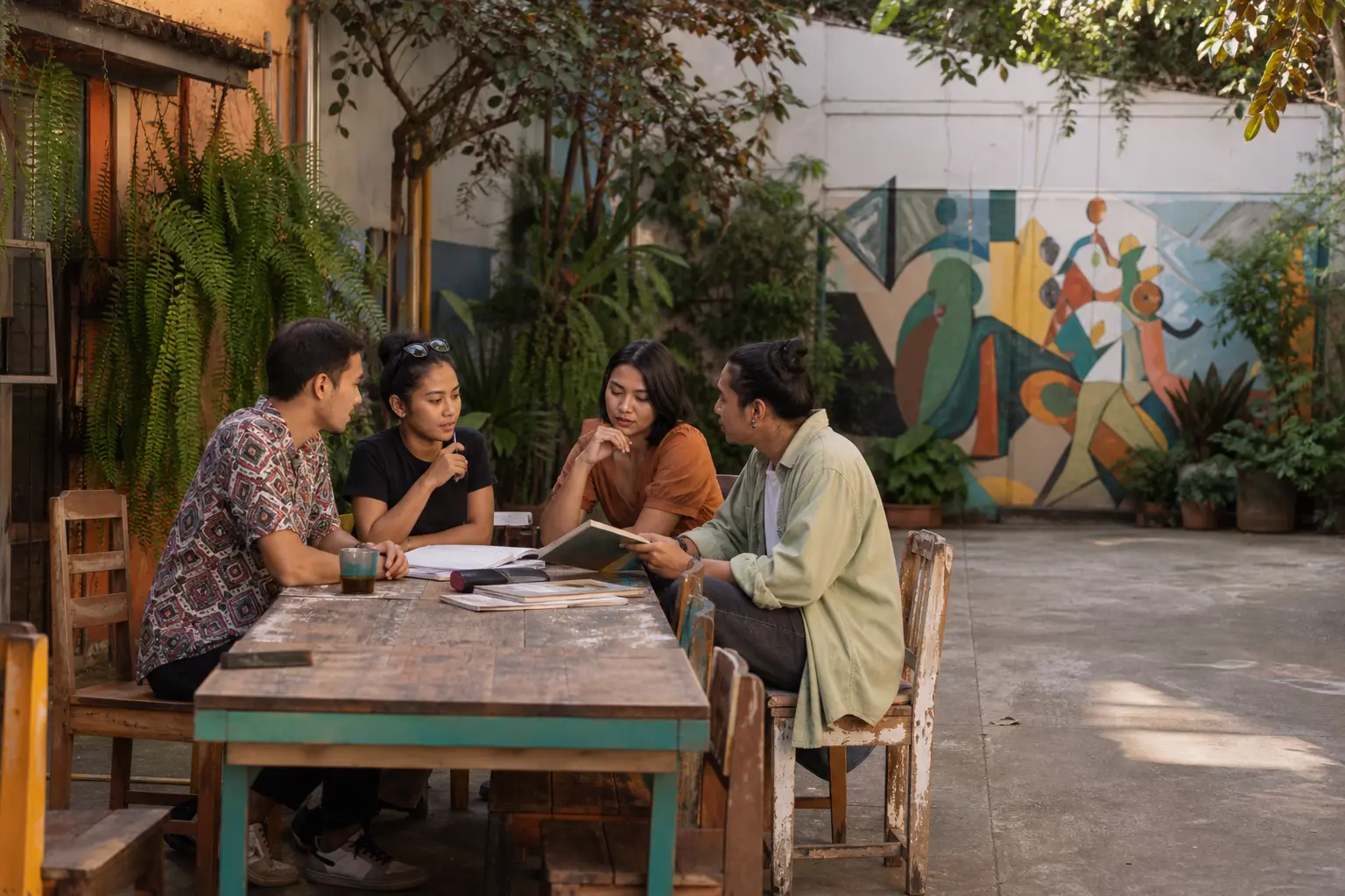 Illustrative creators collaborating outdoors